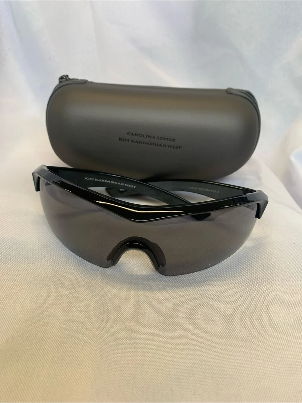 Sleek Black Sunglasses with Hard Zipper Case